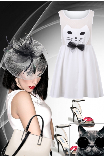 Hvit kjole med katt