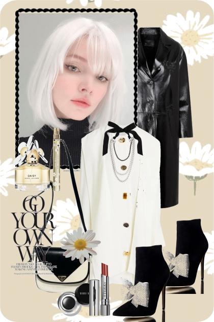 Hvit kjole og sort skinnfrakk