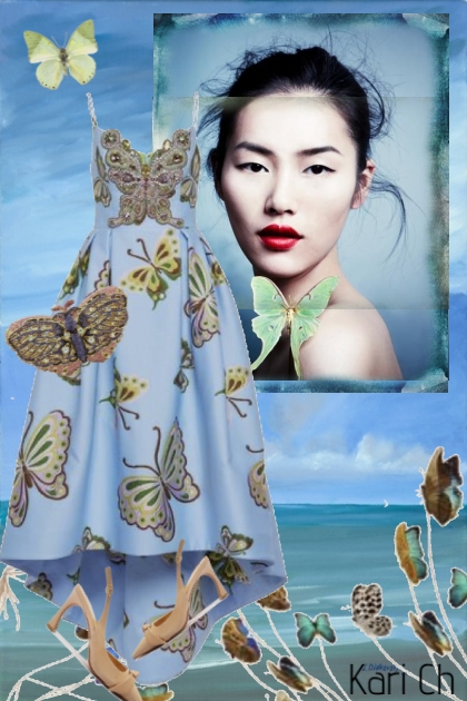Blå kjole med sommerfugler 2-6