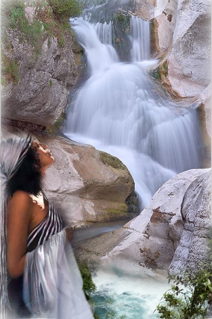 A girl by the waterfalls