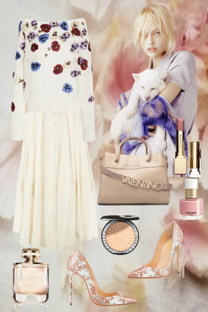 White pullover with blue and red flowers