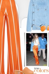 Gigi Hadid - Wearing a Pair of Orange Trousers