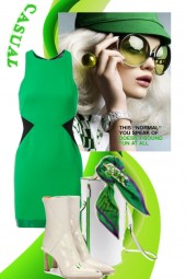 Grønn kjole med hvitt tilbehør