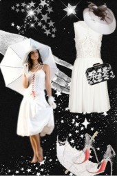 Hvit kjole med paraply og hatt