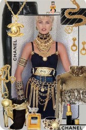 Gull/sort antrekk og Chanel smykker 