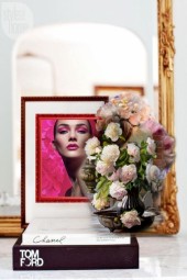 A portrait in a red frame