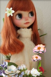 A doll with flowers