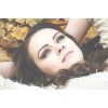 girl laying in leaves fall - モデル - 