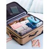 roll suitcase packing - Moje fotografie - 